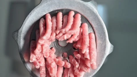 Close up view of meat coming out of the meat grinder 動画素材 142030293