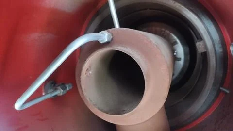 Close-up view of a mechanical component, possibly part of an engine or exha.. Stock Photos