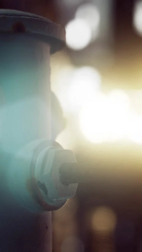 Close view of a mechanical device with metal parts in a dark setting Stock Footage 348089018