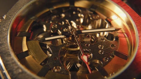 Close view of a mechanical watch showing gears, springs, and intricate details Stock Footage 336220565