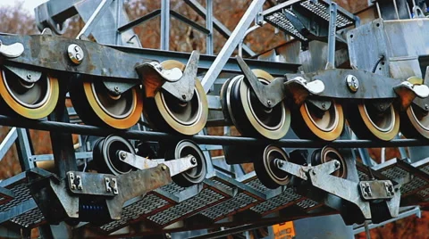 Close-up view of mechanism with rotating rollers driving the cableway Stock Footage 61072482