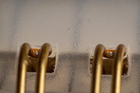 Close-up view of a metal binder ring showcasing its binding quality for Stock Photos