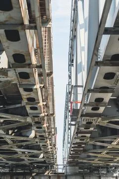 Close-up view of metal bridge structure from below Stock Photos