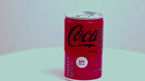 Close up view of metal can of sugar-free Coca-Cola rotate in background. Stock Footage 223871874