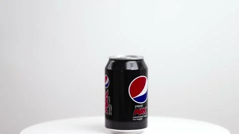 Close up view of metal can of sugar-free Pepsi-Cola rotate in background. Stock Footage 223871880