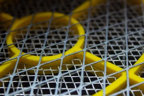 Close view of the metal grid of a electrical bat used to kill mosquito Stock Photos