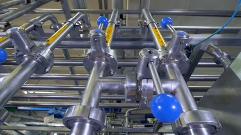 A close-up view on metal handles with blue knobs. Video stock 80596233