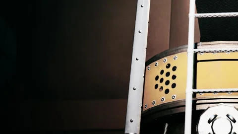 Close view of a metal ladder next to a round industrial drum in a factory Stock Footage 342052740