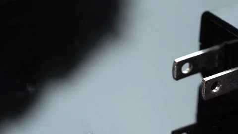 Close-Up View of Metal Power Plug Showing Detailed Connection Design Stock Footage 318901702