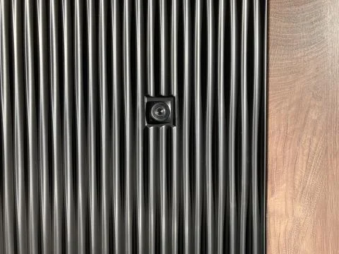 Close-up view of a metal surface, possibly an air vent or grill, with repet.. Stock Photos