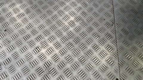 Close-up view of a metallic diamond plate surface. Stock Footage 314261897