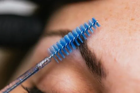 Close-up view of a microblading procedure for enhancing eyebrow definition Stock Photos