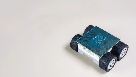 Close-up view of a microprocessor or CPU on 4 wheels Stock Photos