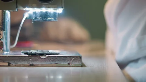 Close-Up View of Microscope Focusing on Circuit Board with LED Lights Stock Footage 283123882