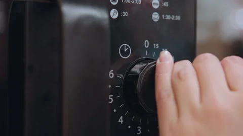 Close view of microwave dial and textured knob. Closeup of microwave interface Stock Footage 341769438