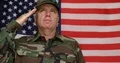 Close View Military Honor Salute Proud Soldier US Flag Woodland Army Uniform 4k or 4k+ Resolution