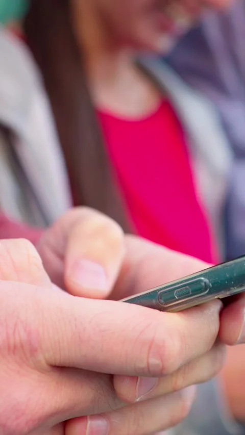 Close-up view of millennial young people hands using smartphones outdoors. Stock Footage 251029200
