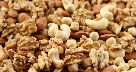 Close up view of mixed nuts rotating 1 Stock Footage 148168212
