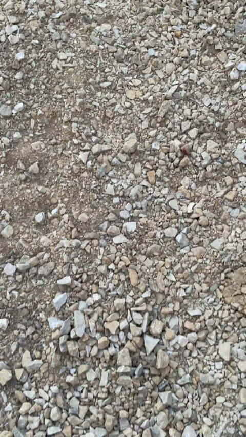 Close-Up View of Mixed Stones on Ground – Natural Gravel Surface 4K Vidéo 201499930