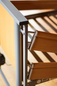 Close-up view of a modern bed frame showcasing stylish materials and intric.. Stock Photos
