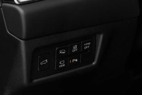 Close up view of modern car electronic safety systems control panel. Modern c Stock Photos