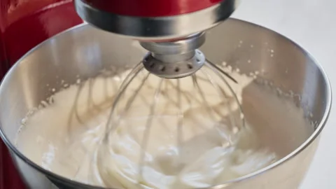 Close-up view of a modern kitchen mixer in action. Slow motion footage. 50 fps. Stock Footage 309299124