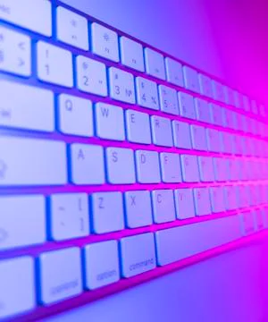 Close up view of a modern laptop computer keyboard keys. Soft lightning. Comp Stock Photos