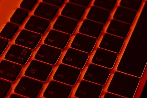 Close up view of a modern laptop computer keyboard keys. Soft lightning in .. Stock Photos