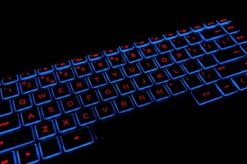 Close up view of a modern laptop computer keyboard keys. Soft lightning in .. Stock Photos