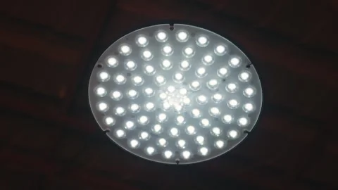 Close-up view of a modern round LED ceiling light Vídeo Stock 346582624