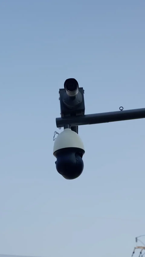 Close-up view of modern security surveillance camera system mounted outdoors on Vídeos de archivo 310488919