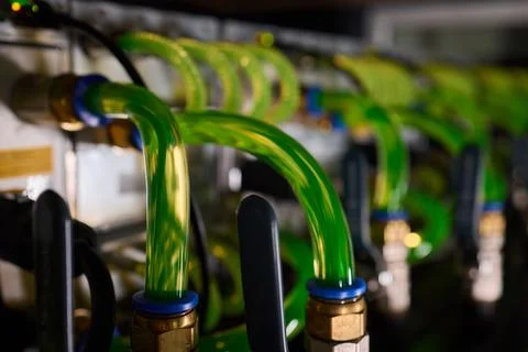 Close-up view of modern server hardware with liquid cooling pipes ensuring op Stock Photos