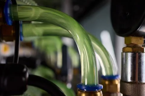Close-up view of modern server hardware with liquid cooling pipes ensuring op Stock Photos