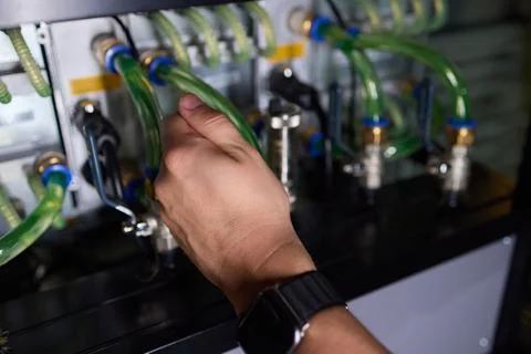 Close-up view of modern server hardware with liquid cooling pipes ensuring op Stock Photos