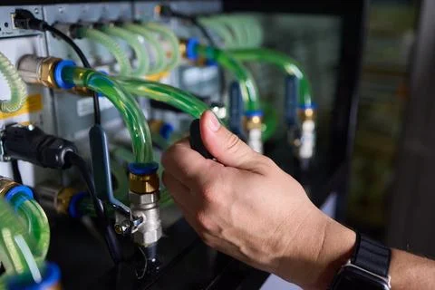 Close-up view of modern server hardware with liquid cooling pipes ensuring op Stock Photos