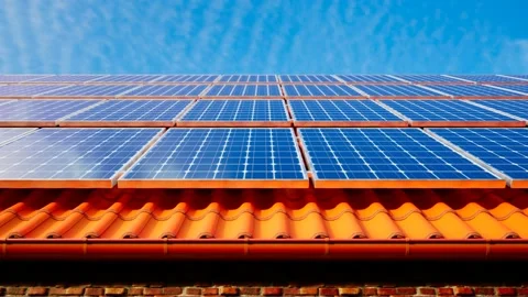 Close view of a modern solar panel during sunset. Seamless looping animation. 4K Stock Footage 201228640