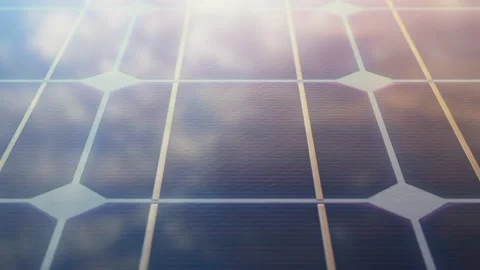 Close view of a modern solar panel during sunset. Seamless looping animation. 4K Stock Footage 260897135