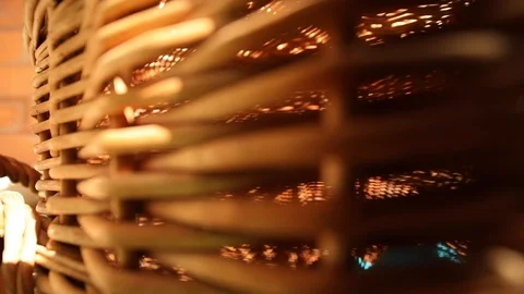 Close up view of modern straw basket with warm summer sunshine on blur 스톡 동영상 98230025
