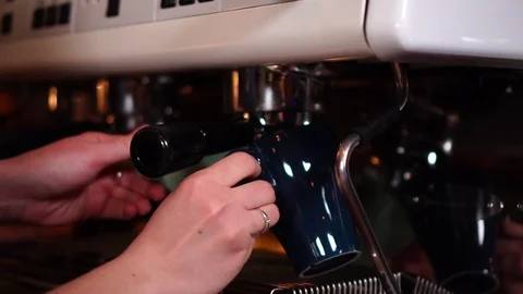 Close up view on modern technology espresso machine making hot coffee drink in Stock Footage 104511377