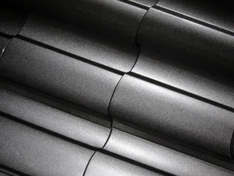 Close-up view modular tile effect roof panel. Lightweight galvanised steel ro Stock Photos