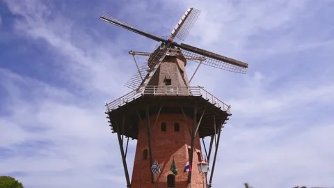 Close up view of Moinho Povos Unidos, Holambras windmill spinning in the wind Stock Footage 218505367