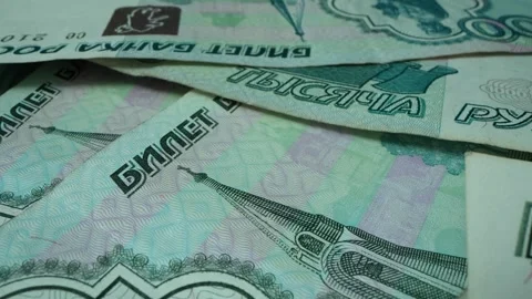 A close-up view of money being counted by a machine Stock Footage 312044780