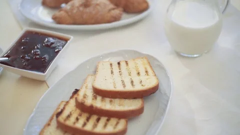 Close up view of morning breakfast. Close up view of table with white tablecloth Stock Footage 77394874