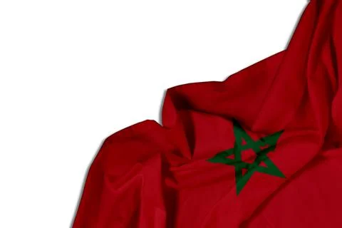 Close view of the Moroccan flag draped against a white backdrop, featuring a viv Stock Photos