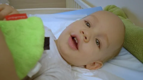 Close View Mother Changing Blond Little Baby Boy Stock Footage 102869107