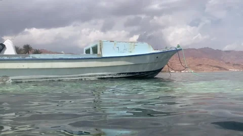 Close Up View of Motor Boat Left on Wate... | Stock Video | Pond5