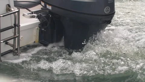 Close up view at motor ship, motorboat engine Yamaha, sailing in bubbling water 動画素材 302994076