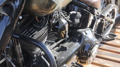 Close up view of a motorcycle engine. exhaust pipe. Video stock 89434661