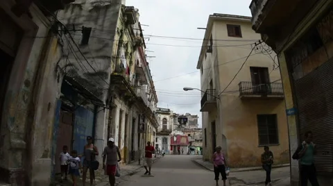 Close-up view from the moving retro car on old shabby streets, ragged houses and Stock Footage 67831862