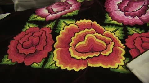 A Close Up View of A Multicolored Floral Printed Fabric With a Black Background Video stock 19328002